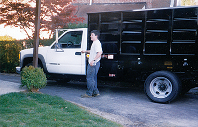 Brendan Gibbons with his first truck | Gibbons Landscaping