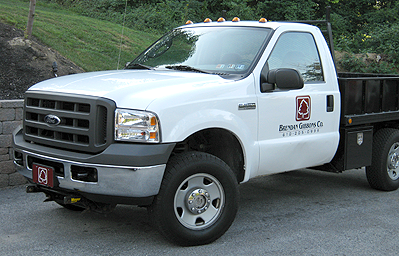 All of our trucks now display our company logo | Gibbons Landscaping